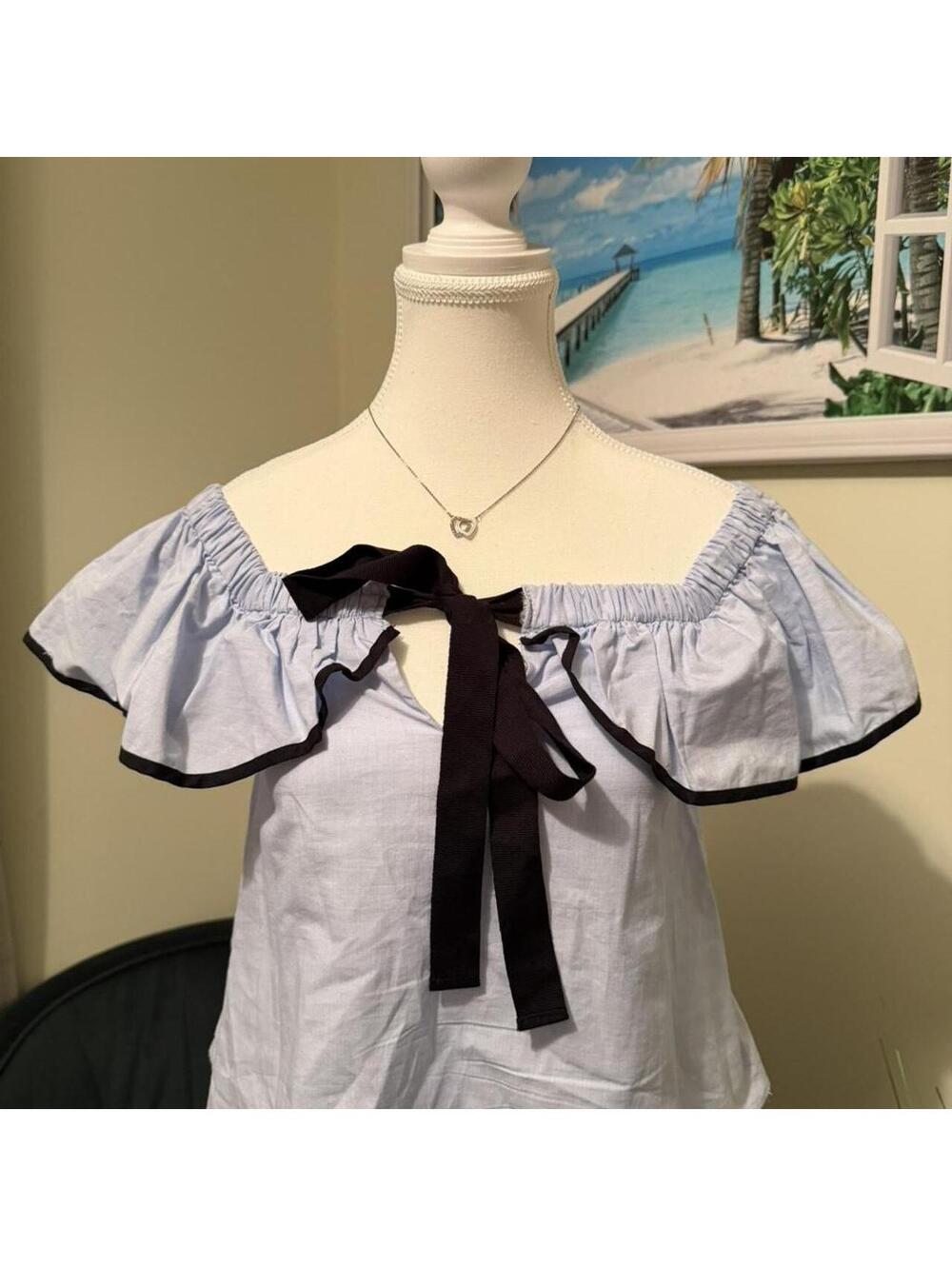 ZARA blue off the shoulder blouse with black ribbon bow detail.